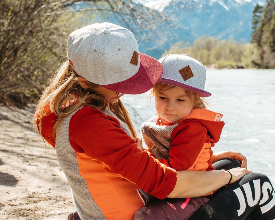 Familien aus unserer Community mit ihren Soulbuddy Caps & Beanies im Partnerlook