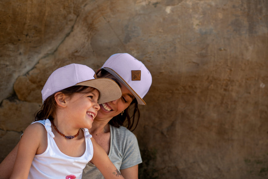Familien aus unserer Community mit ihren Soulbuddy Caps & Beanies im Partnerlook
