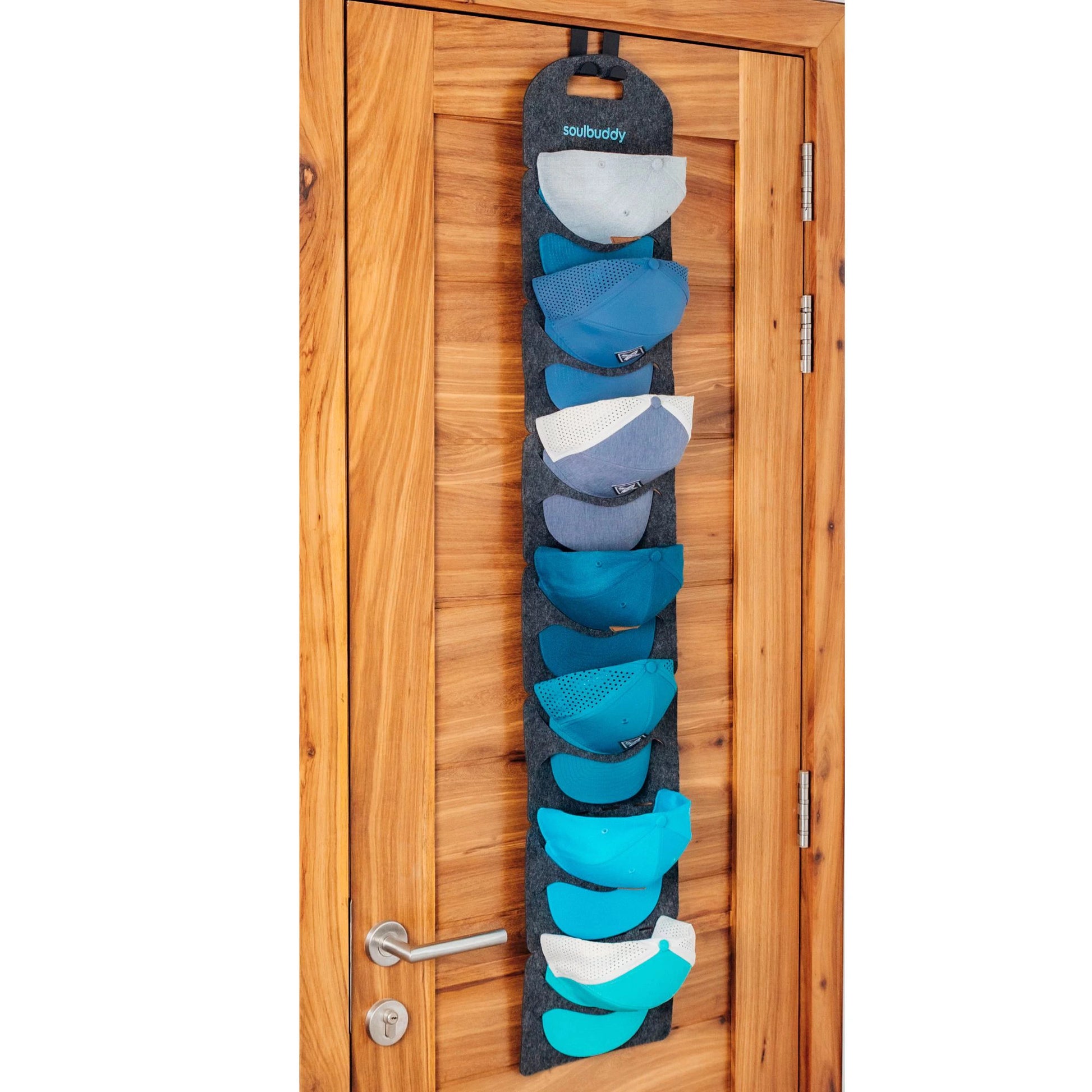Cap Organizer mit 7 Caps an Tür