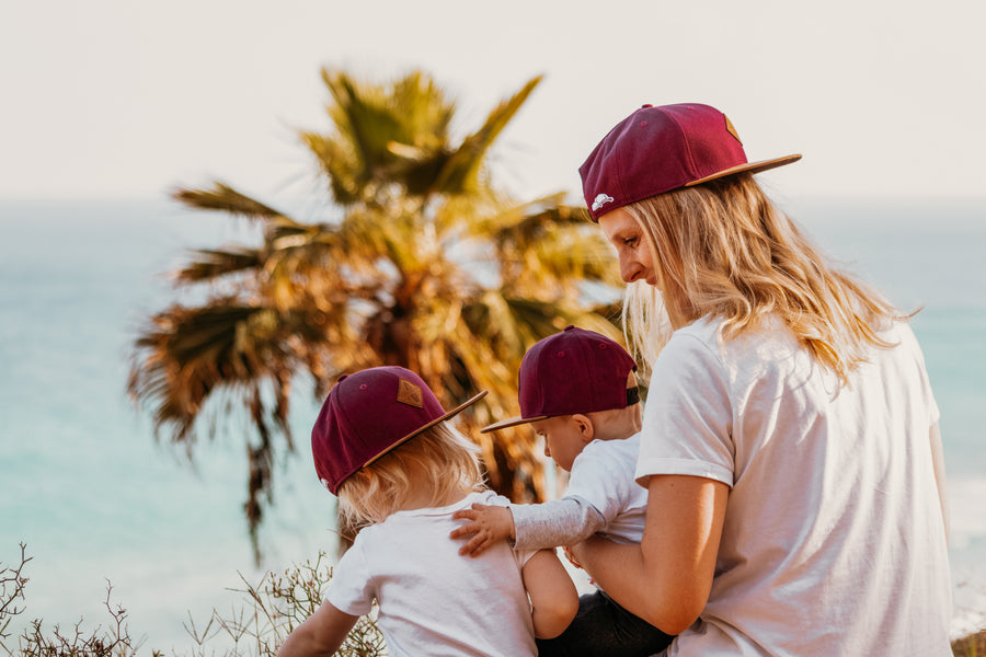Familien aus unserer Community mit ihren Soulbuddy Caps & Beanies im Partnerlook
